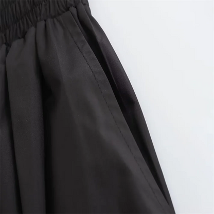 Mooyufon 2025 Women's temperament versatile loose and casual solid color high waisted skirt medium length A-line skirt